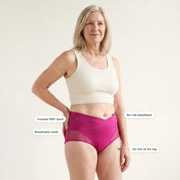 Crossed 360 degree band, no-roll waistband, breathable mesh