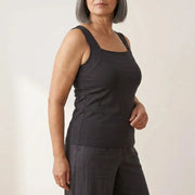The built-in bra tank in Black, turned to the side